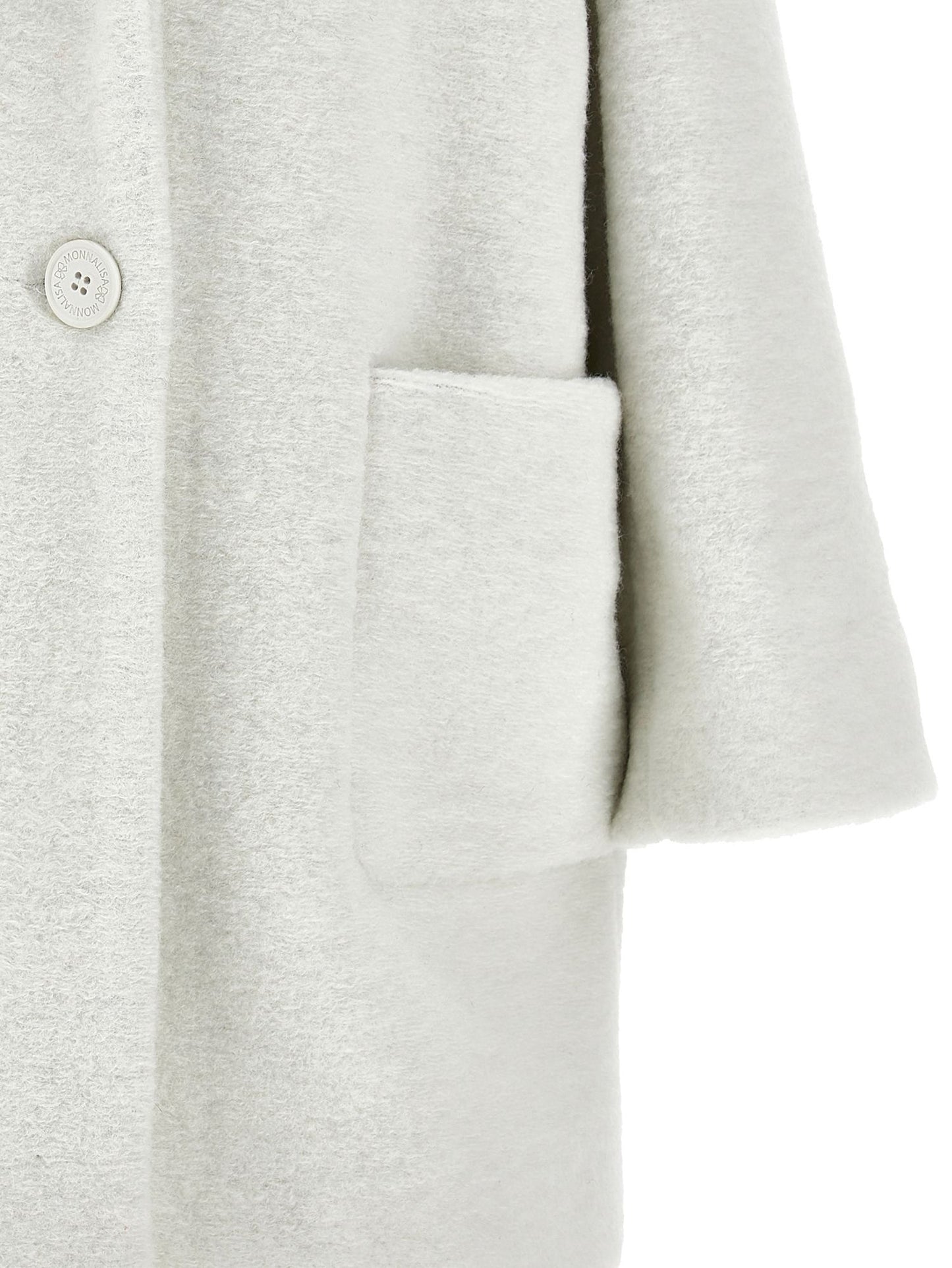 Oversized coat with heart-shaped cloth