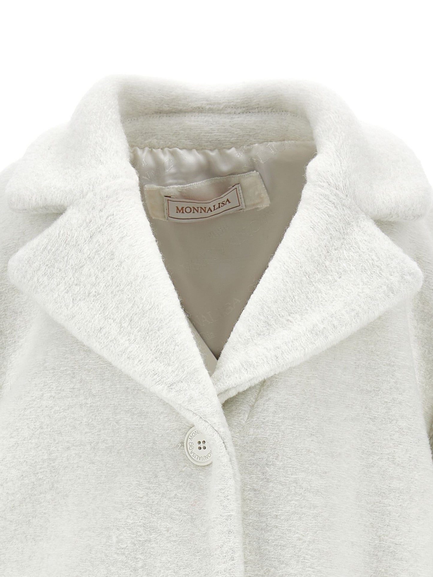 Oversized coat with heart-shaped cloth