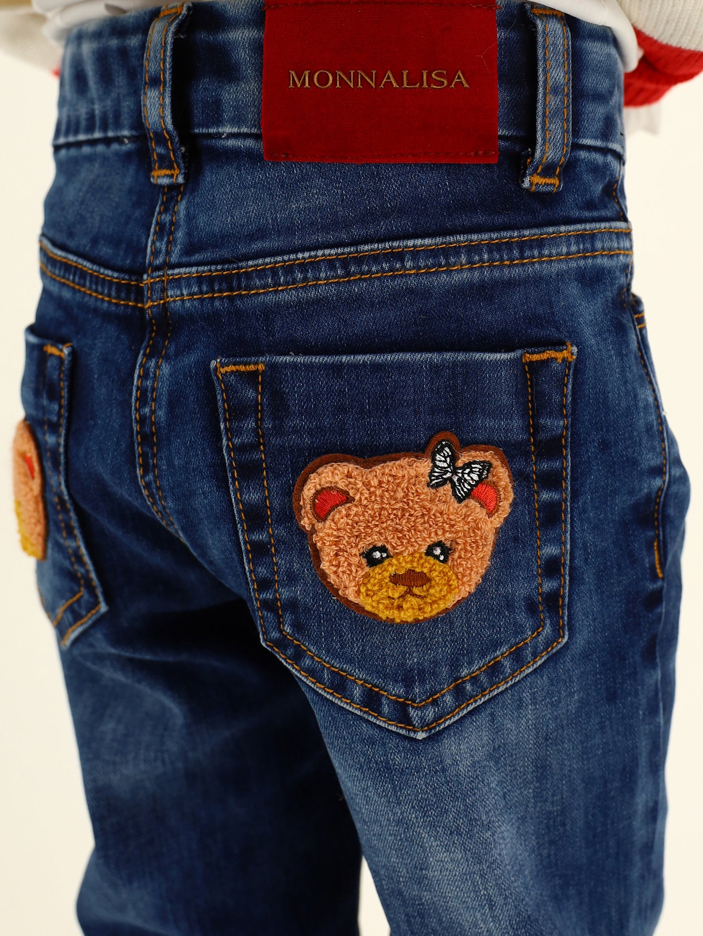 Embroidered five-pocket jeans