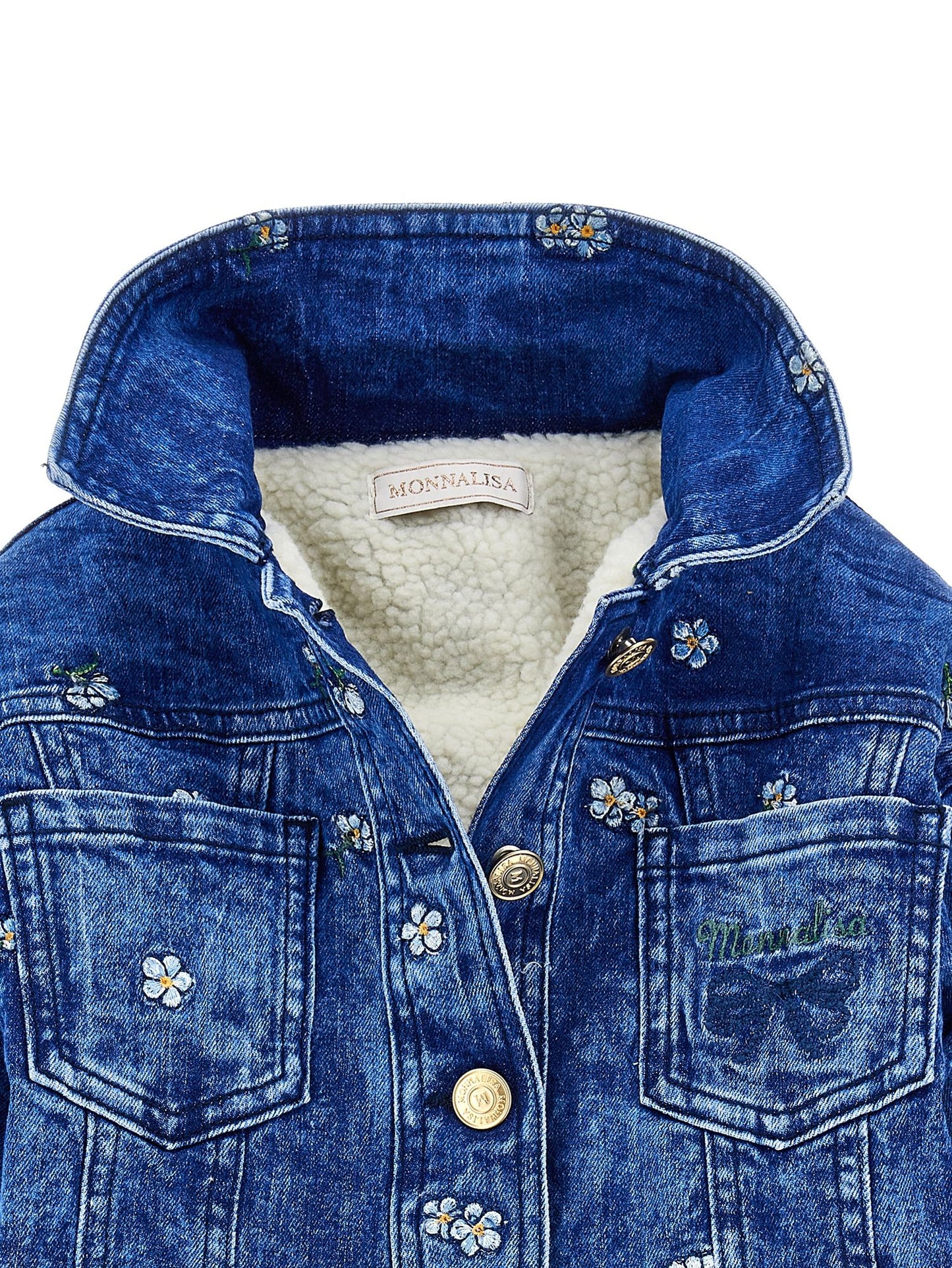Denim jacket with teddy bear