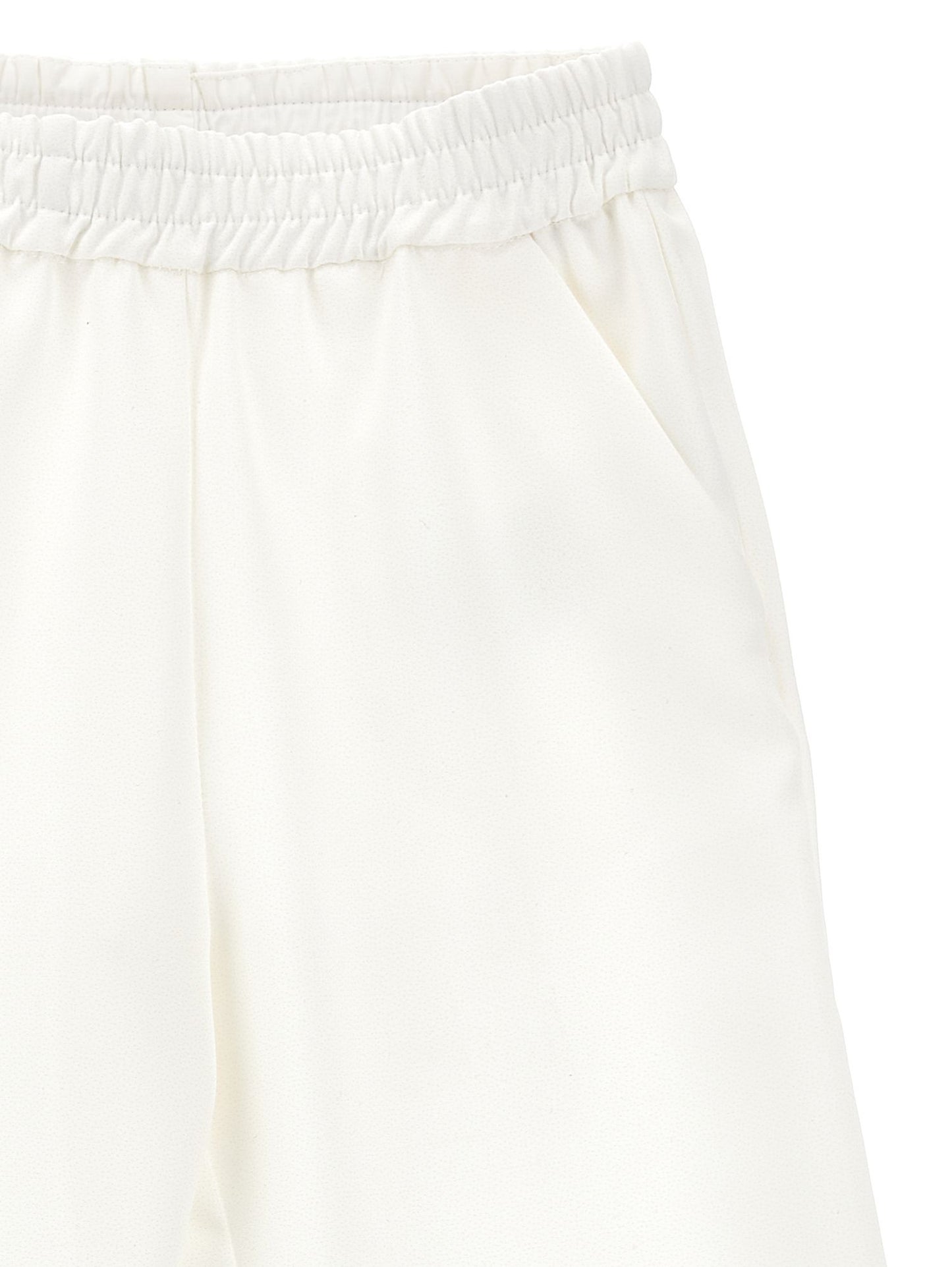 Magnolia print palazzo trousers