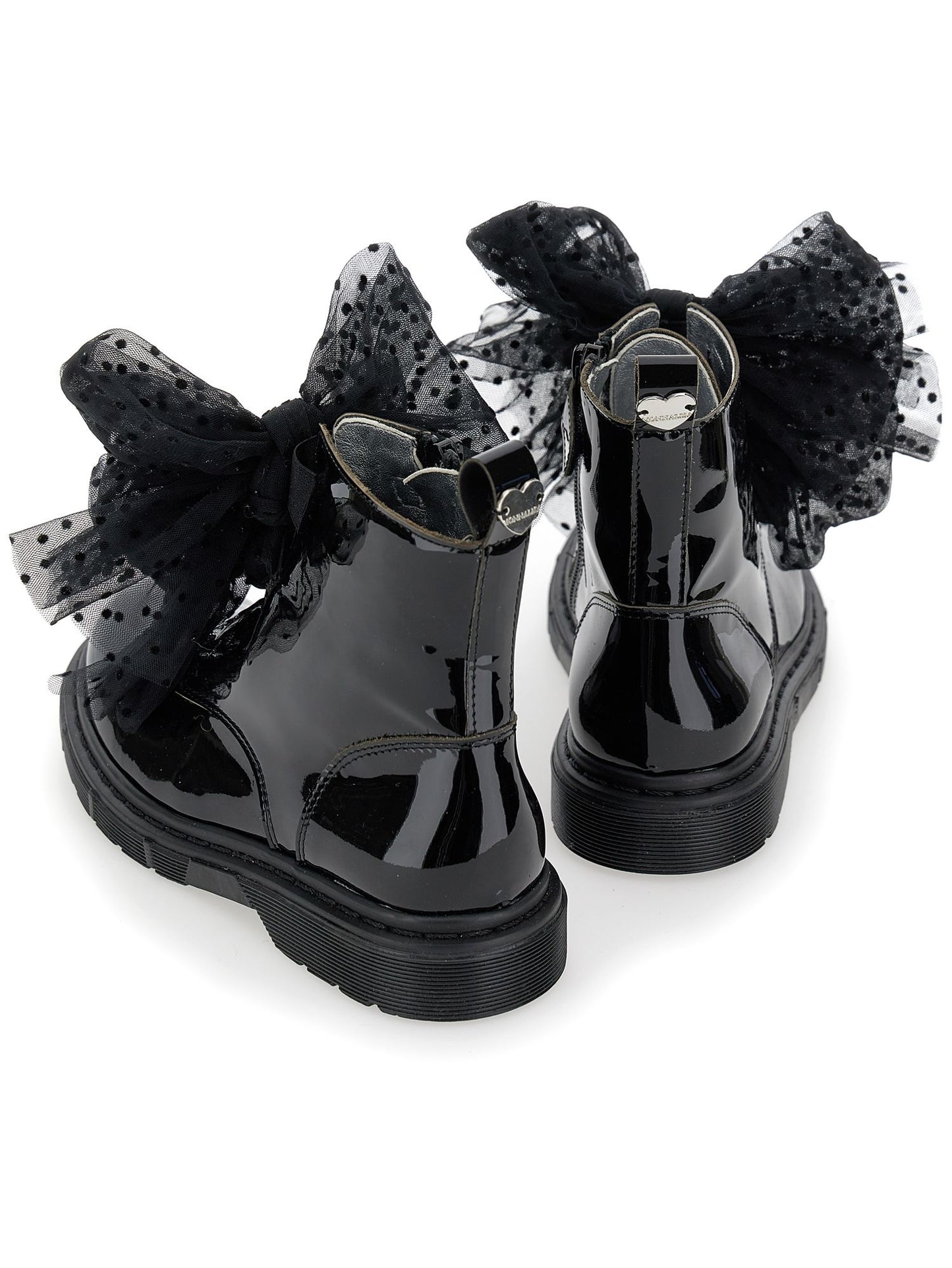 Leather amphibians with tulle bows