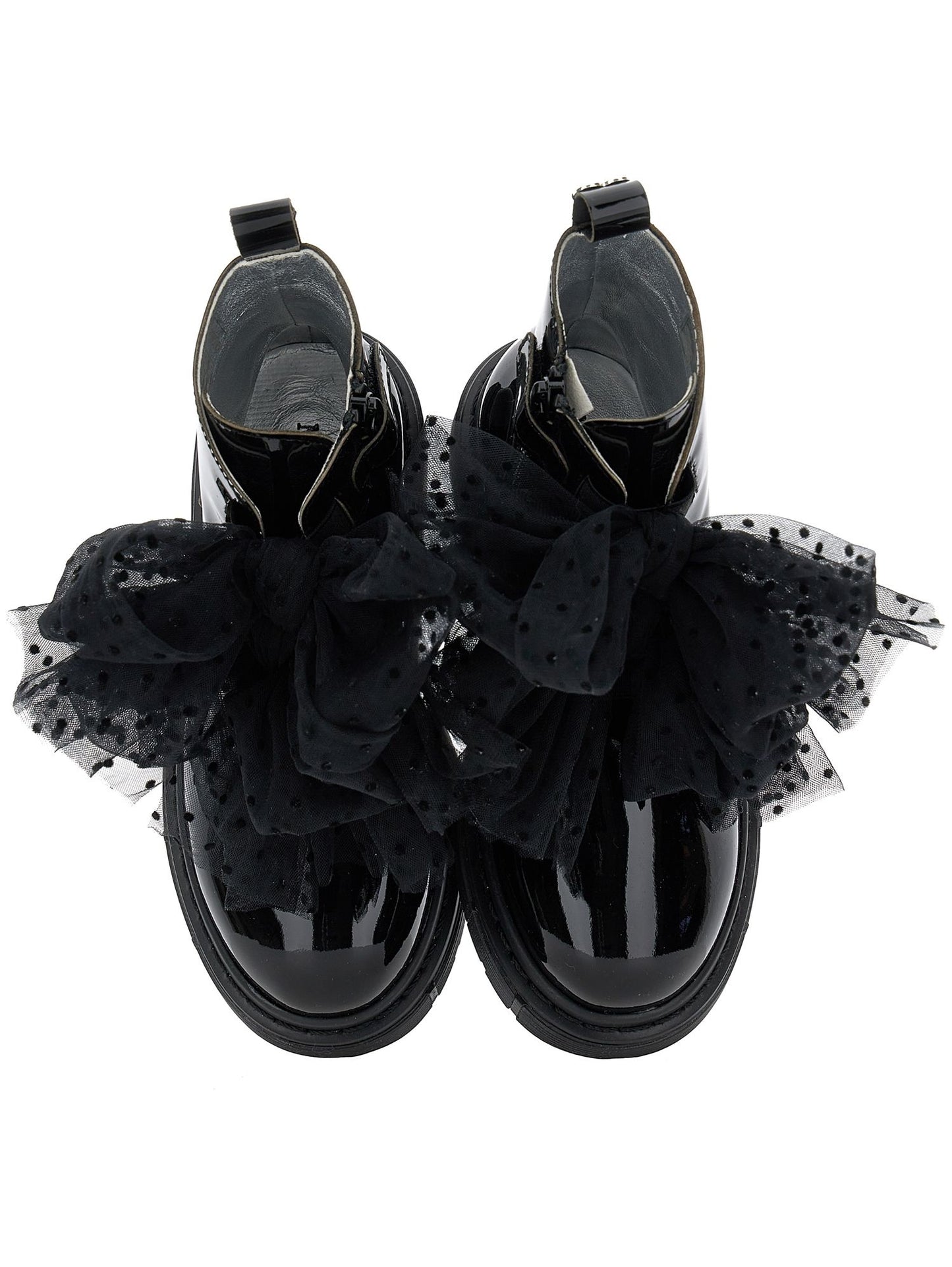 Leather amphibians with tulle bows