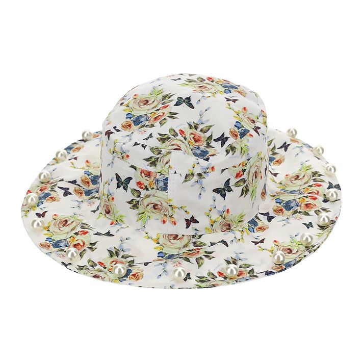 Hat with pearls on the brim