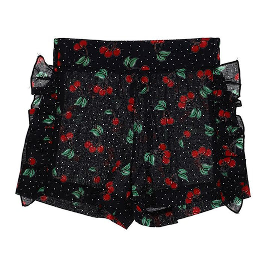 Girls' shorts with cherries and ruffles