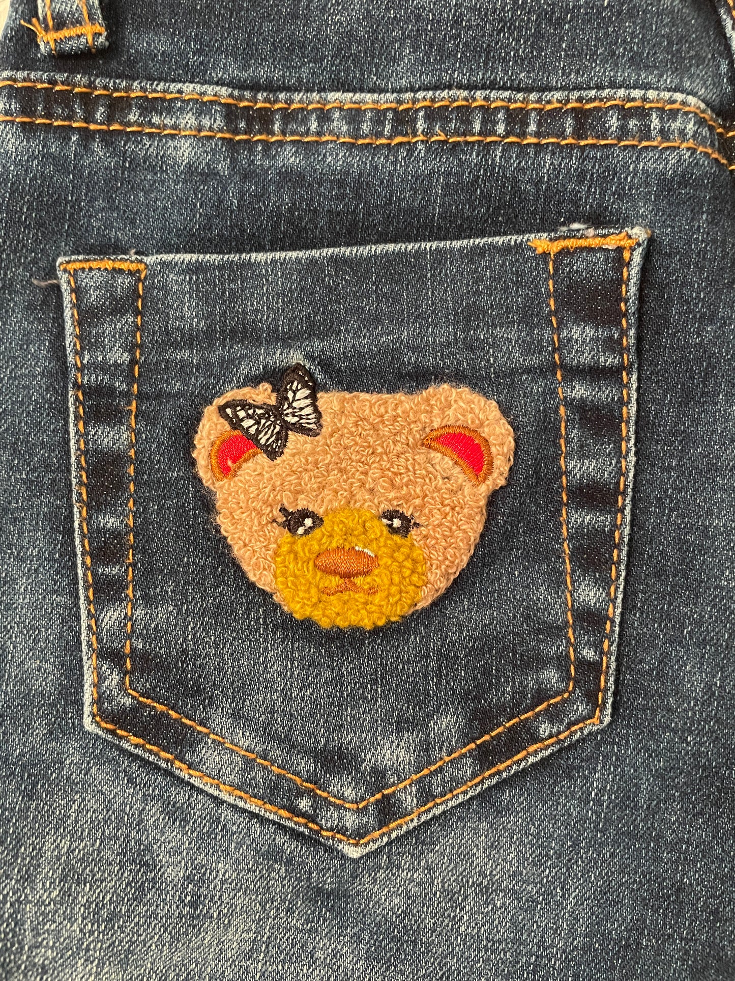 Embroidered five-pocket jeans