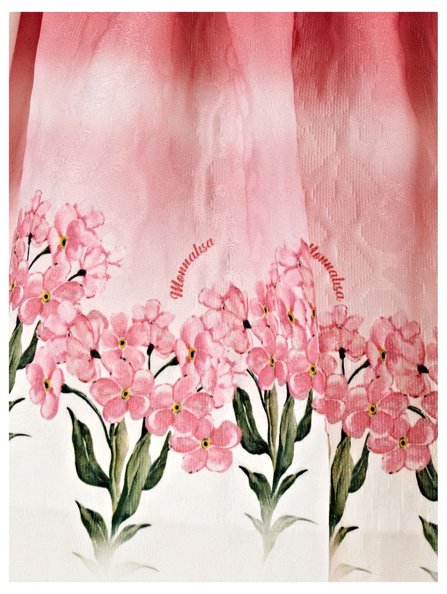 Abito matelassé con gonna florale