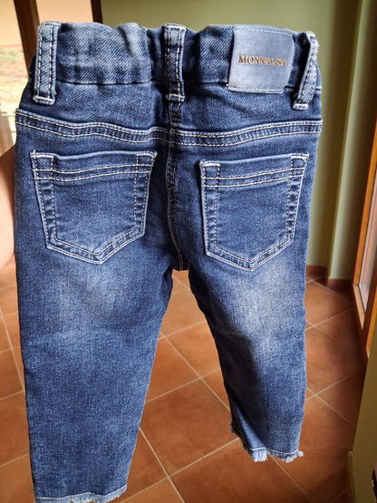 Jeans with embroidered daisies
