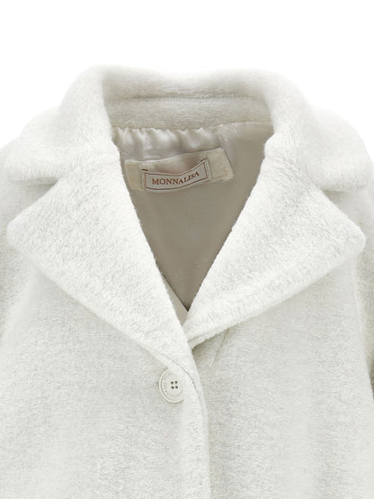 Oversized coat with heart-shaped cloth