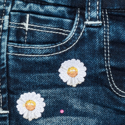 Jeans with embroidered daisies