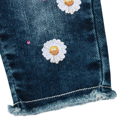 Jeans with embroidered daisies