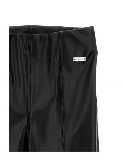 Coated fabric trousers with slits