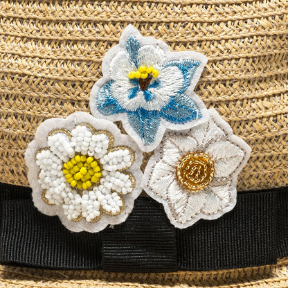 Straw hat with flowers