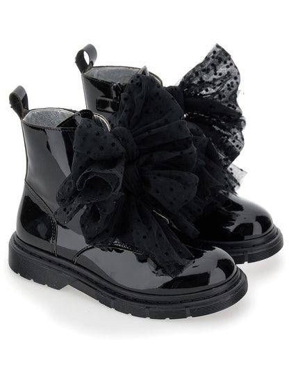 Leather amphibians with tulle bows