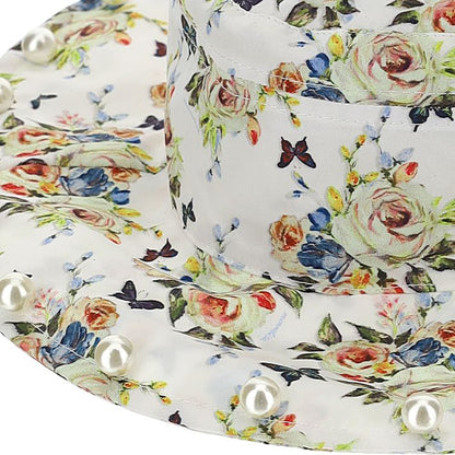 Hat with pearls on the brim
